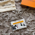 White designer cardholder with box
