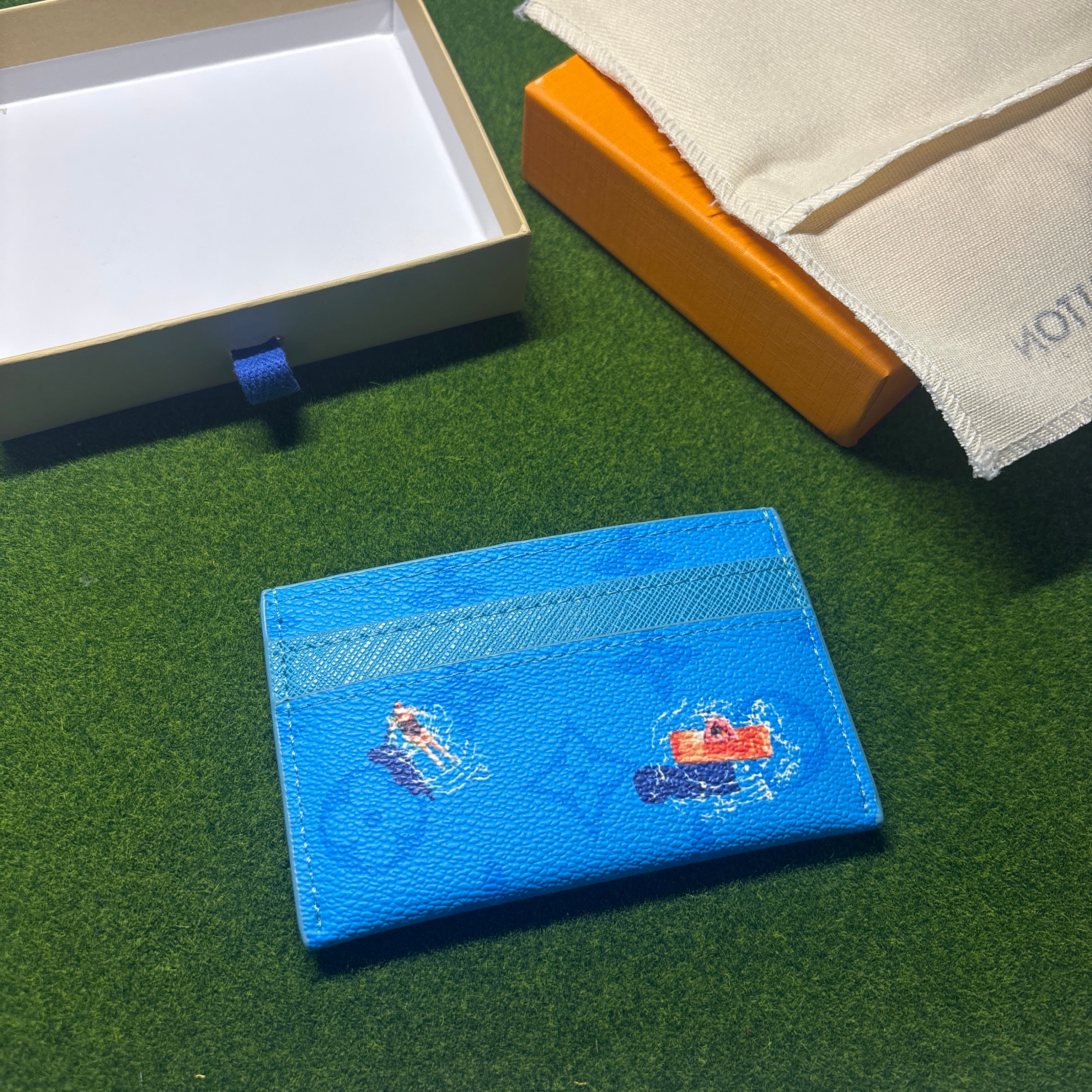 Blue designer cardholder with box