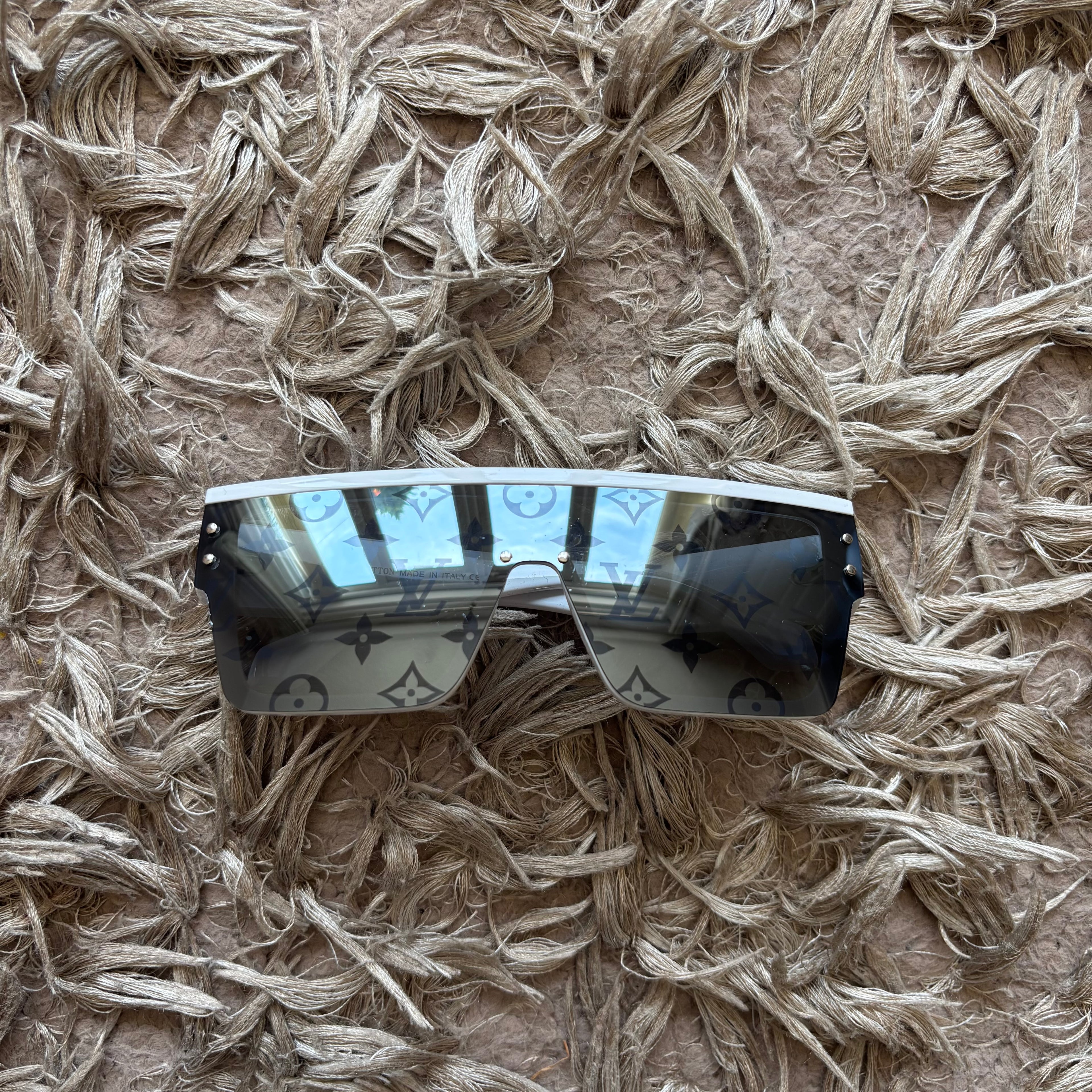 White reflective designer glasses without box