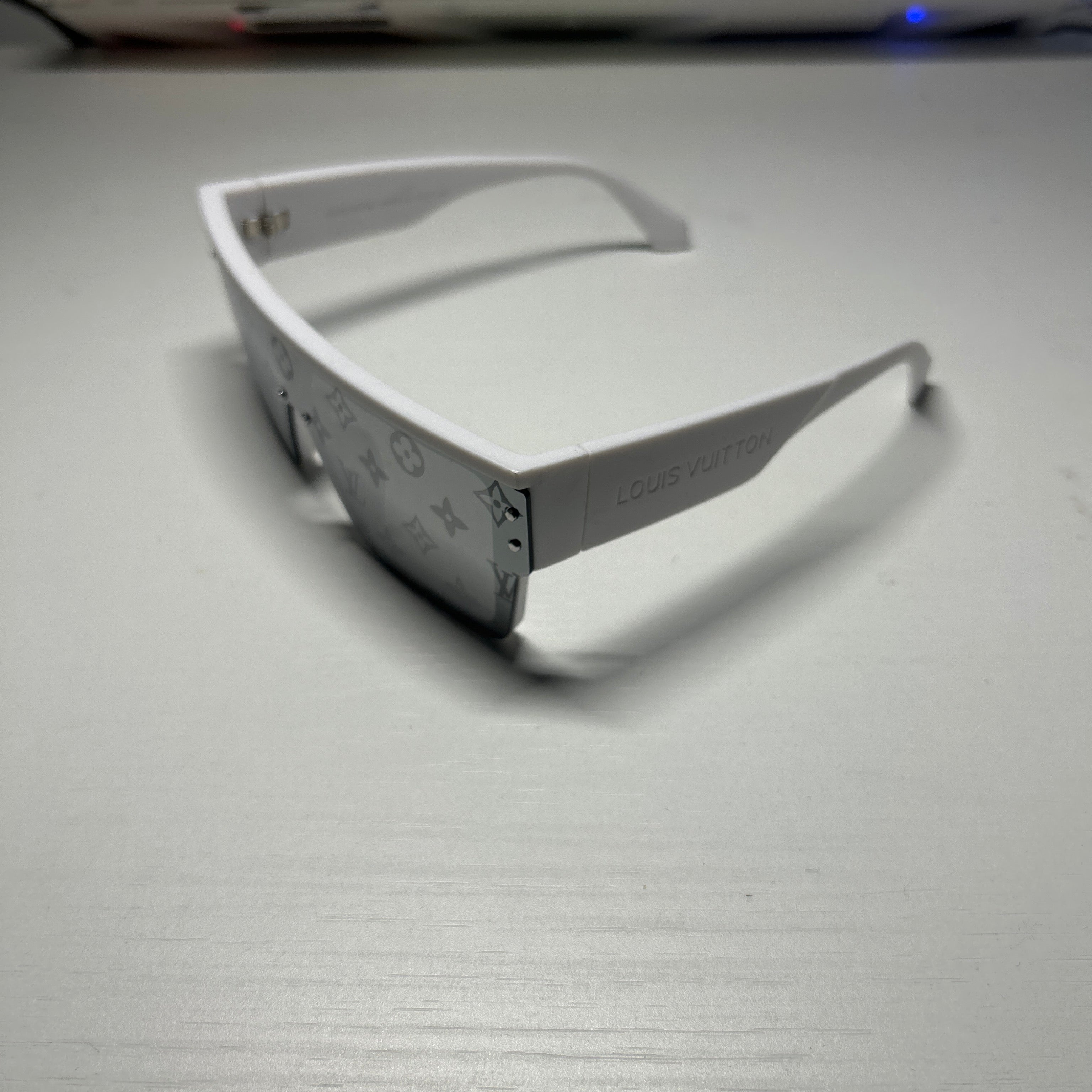 White reflective designer glasses without box