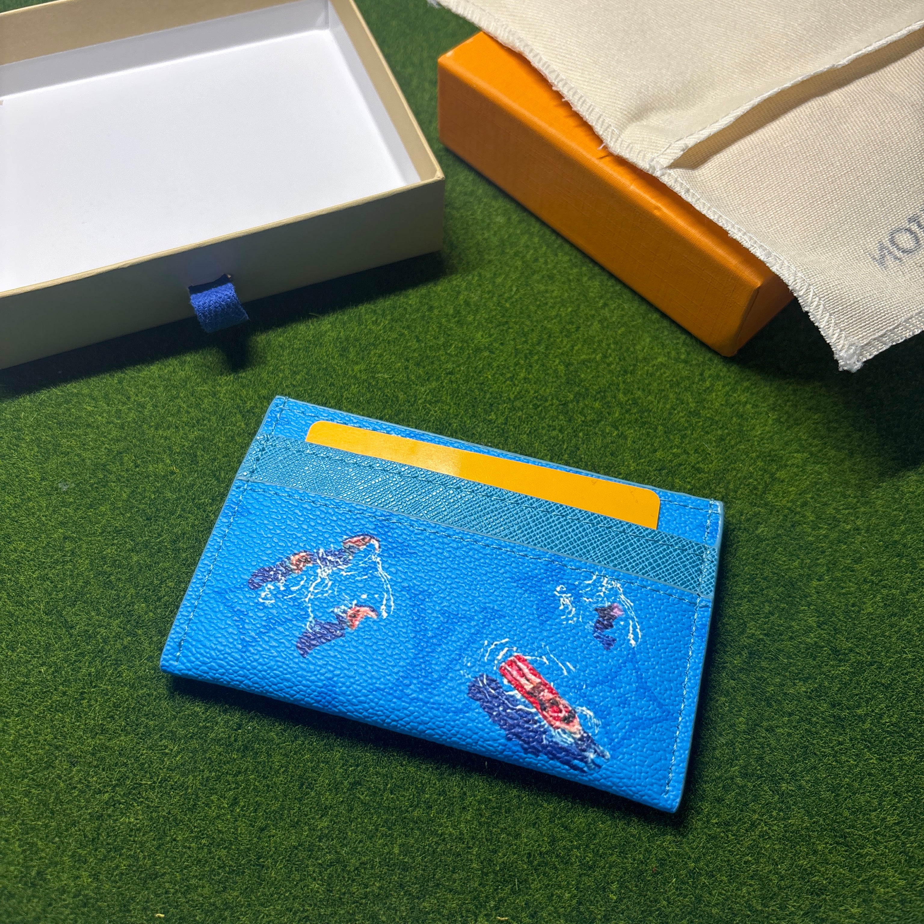 Blue designer cardholder with box
