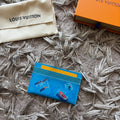 Blue designer cardholder with box